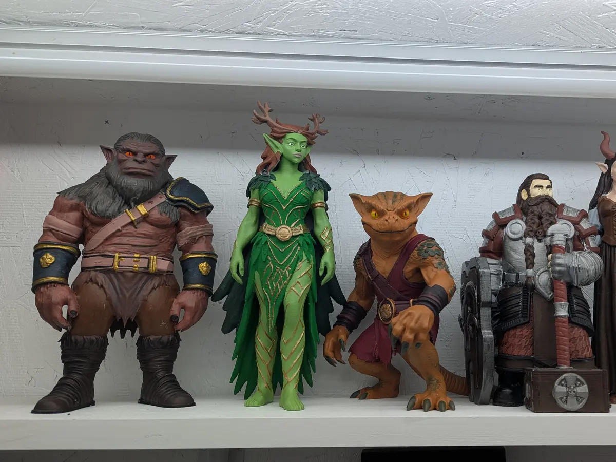 Resin 3D printing by Kulworks: high-detail painted tabletop miniatures, character models, and a fresh print curing